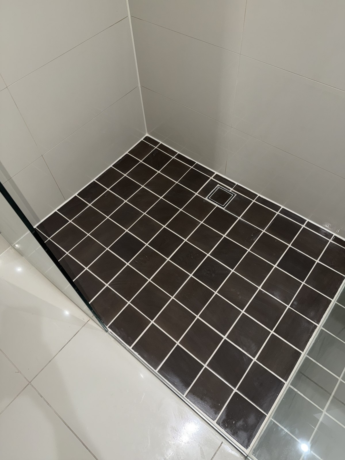 Epoxy grouted shower floor by GC Grout Masters