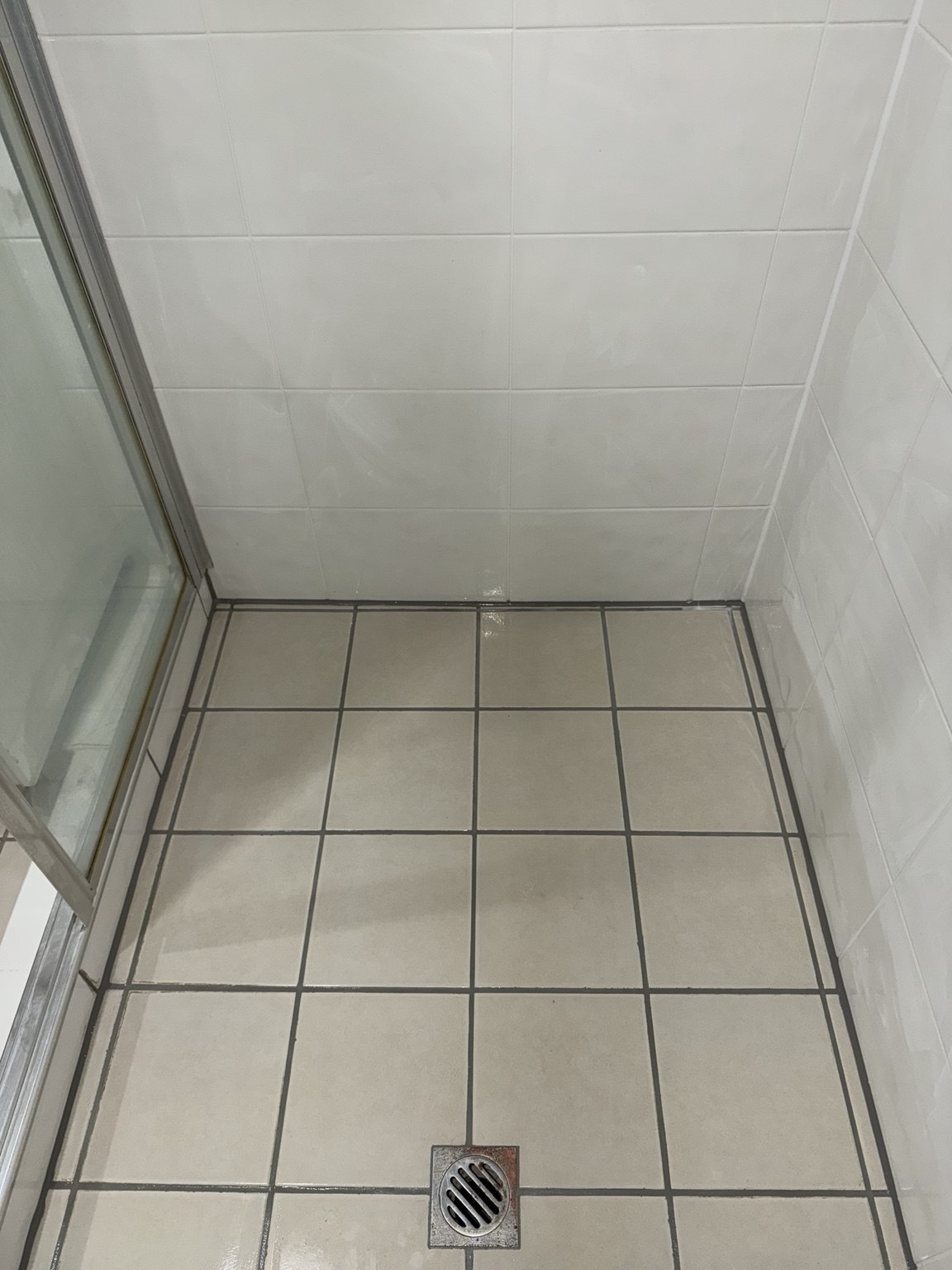 Shower floor grout work by GC Grout Masters