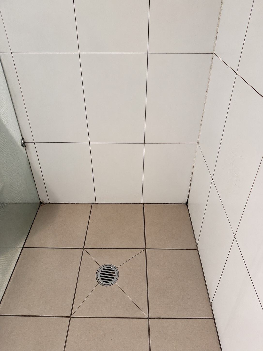Shower before regrouting by GC Grout Masters
