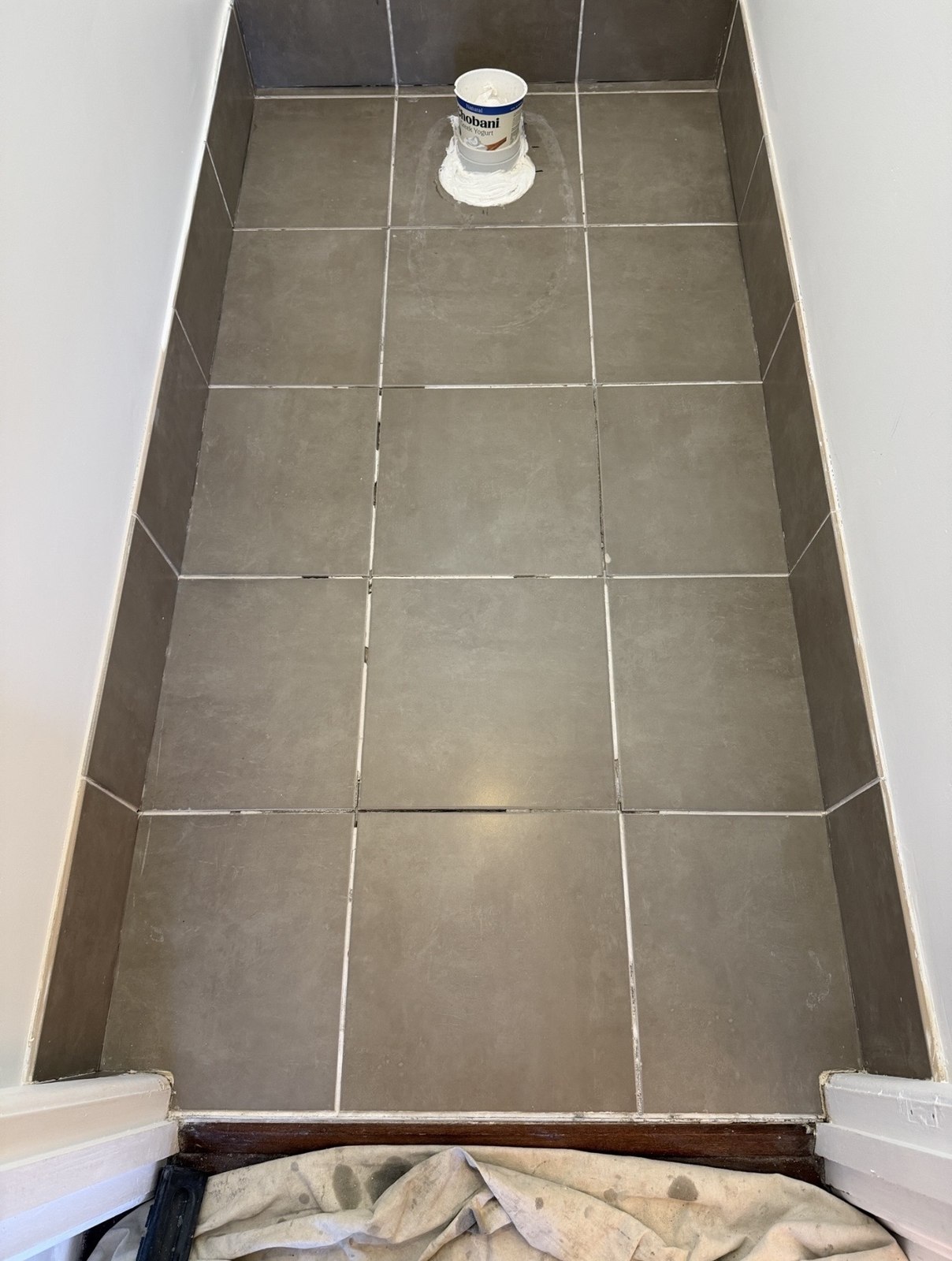 Tiled floor before regrouting by GC Grout Masters